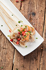 Cold pot scallop skewers