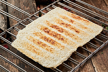 Mongolian traditional charcoal-grilled milk skin