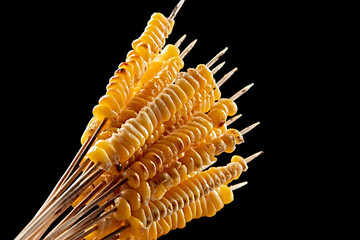 Charcoal-grilled corn kernel skewers