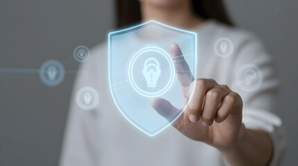 Woman interacting with digital security shield displaying fingerprint authentication
