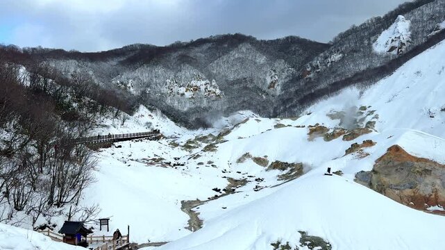 Scenic view of Jigokudani Hell Valley Volcano in winter, Noboribetsu , Hokkaido