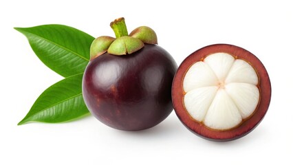 Mangosteen whole and halved revealing juicy white segments with green leaves isolated on white background
