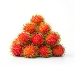 Rambutan fruits with spiky red and yellow exteriors piled in a pyramid shape isolated on white background