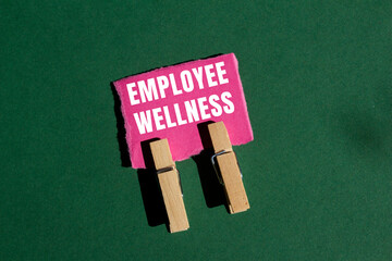 Employee wellness message written on ripped torn paper background. Conceptual Employee wellness symbol. Copy space.