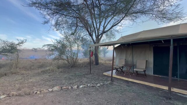 Wildfire has come dangerously close to a tented camp in Serengeti National Park, Tanzania.