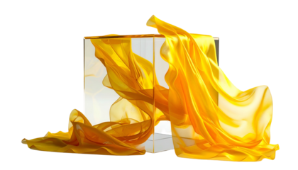 Transparent cube with flowing yellow fabric against a black background