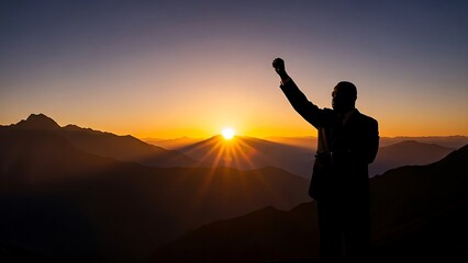 Inspirational Silhouette of Man Pointing at Vibrant Sunrise Over Majestic Mountain Range - Nature Beauty and Motivation