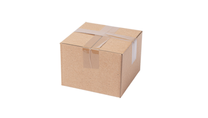 A cardboard box is presented at an angle with a slightly unclear focus, it is a brown cube shape solid white background and no background