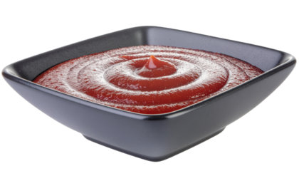 Red sauce with a swirl pattern inside a square gray bowl with a glossy finish, casting a shadow below clean white background cutout