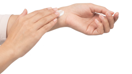 Close up of Hands Applying Cream to Wrist, White Background