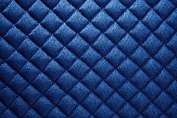 Fototapeta premium Realistic blue quilted fabric texture creating a rich visual depth suitable for interior design and textile applications