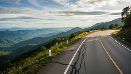 Winding mountain road with scenic view.