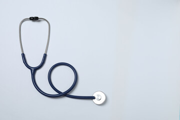 Stethoscope on the table. Medical instrument. Medical concept. Healthcare. Health Day. Doctor's equipment. Cardiology. Heart disease. Lung diagnostics. Diagnostics of respiratory inflammation.
