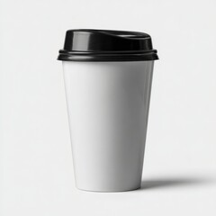 White coffee cup with black lid on plain background