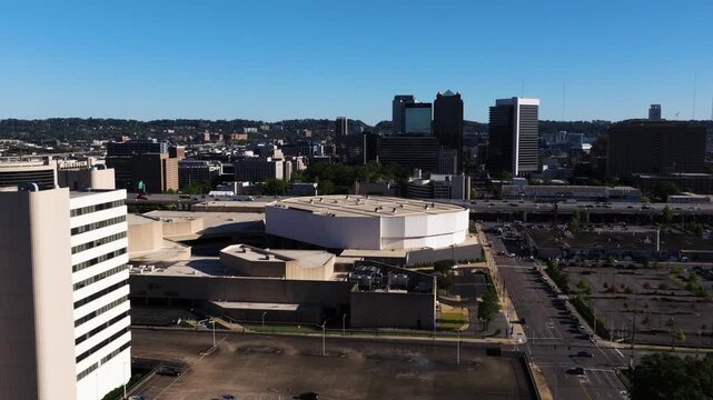 Aerial of Birmingham Jefferson Convention Complex showcasing modern arena and surrounding downtown blocks, midday establish