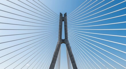 Modern cable-stayed bridge pylon with sleek metal cables against clear blue sky
