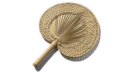 Handheld woven straw fan rests diagonally against a stark white background casting a deep shadow.