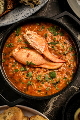Portuguese traditional food Crab soup risotto meal on restaurant table in lisbon