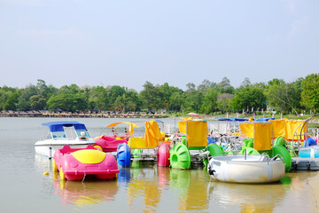 Colorful pedal boat on the river in the park in Thailand