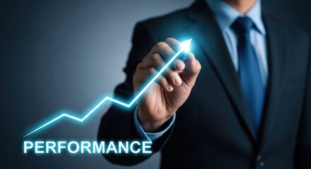 Businessman drawing upward performance graph with glowing line