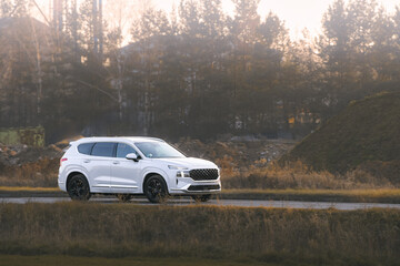 stylish automobile on quiet rural street