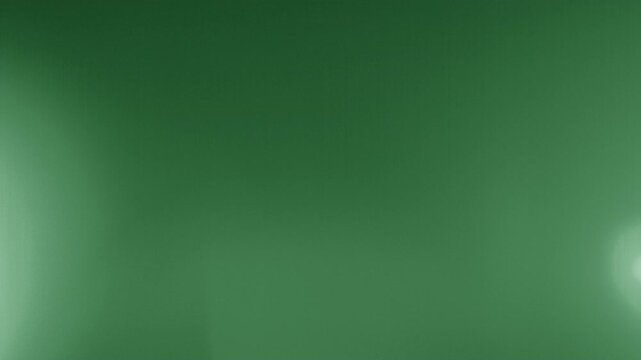 Green tint leak overlay with a moving from bottom to the top creating a veiling flare