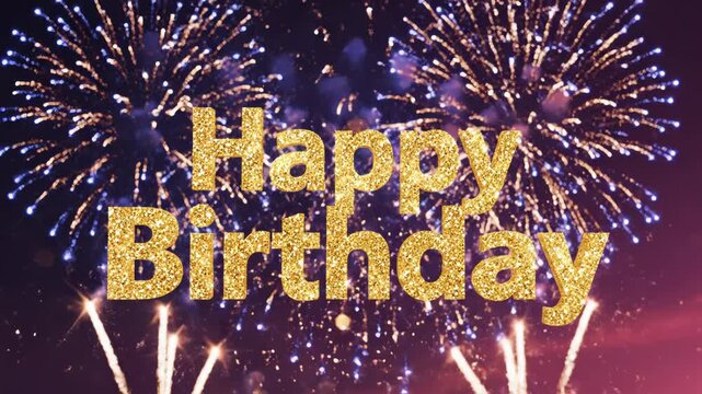 Glitter gold text happy birthday message overlaying a vibrant, celebratory fireworks display at night for a festive occasion
