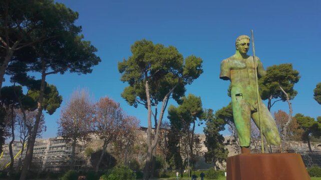 Pompeii showcases Daedalus at the entrance, creating a striking contrast between classical ruins and contemporary artistic expression