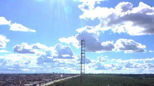 Static overhead reveals urban&ndash;rural transition zone with highway spine separating developed city core from protected Cerrado grassland, Brazil
