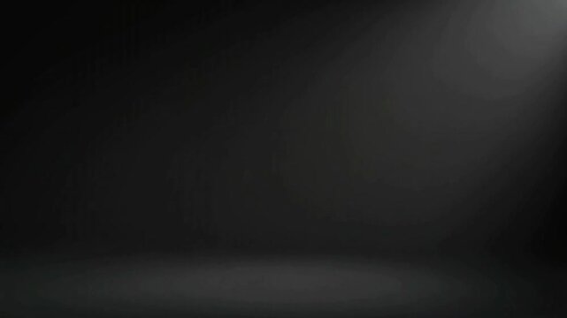 Dark room with spotlight shining down from above creating a dramatic atmosphere