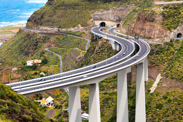 View of the modern Puente de Silva on the northern coast of Gran Canaria, connecting tunnels across the Barranco de Silva with scenic ocean and valley views.