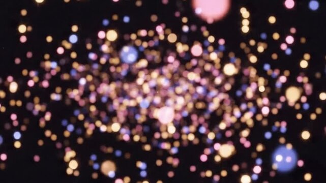 Vibrant abstract background featuring a dazzling array of luminous particles and soft bokeh lights creating a mesmerizing visual display