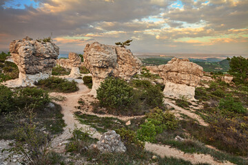 Forcalquier,  Provence-Alpes-Cote d'azur, France: Rochers des Mourres, landscape at sunset of the strange geological formation in a plateau of the Alpes-de-Haute-Provence