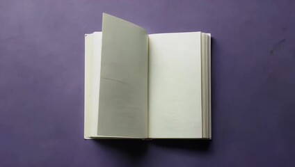 Creative 4K stop motion flat lay of white hardcover book opening closing against purple themed background ideal education storytelling publishing related 