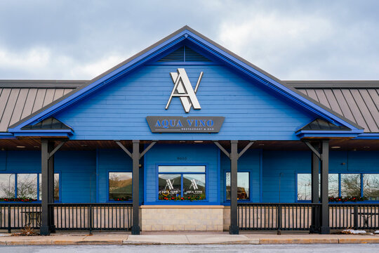 New Hartford, NY - Dec 25, 2025: Close-up view of Aqua Vino Restaurant & Bar, was established in September 2007 by Robert Esche, the president of the Utica Comets, with over 20 locations worldwide