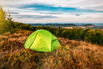 Professional tourist tent in autumn mountains