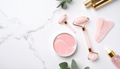 Skincare concept. Top view photo of two barrettes rose quartz roller gua sha pink eye patches dropper bottle with cosmetics and eucalyptus on white marble background with copyspace