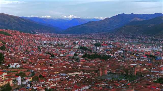 Cusco Cuzco Alejandro Velasco Astete International Airport Peru Per&uacute; cityscape buildings Peruvian Andes landscape aerial drone rainy season sunny afternoon sunset clouds Inca Empire capitol upwards