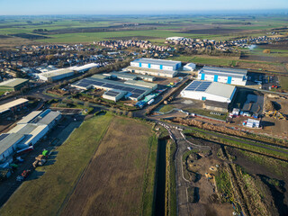 Interesting UAV view of modern industrial buildings seen on the outskirts of the town of Chatteris, Cambridgeshire, UK. The industrial zone is a large employer to the market town. © Nick Beer