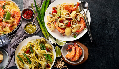 Italian dinner table with assortment of pastas.
