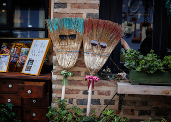 Broom heads, in front of restaurant