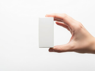 Hand holding a white card