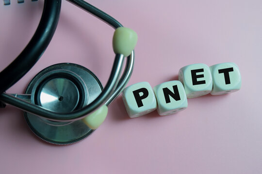 Concept of text PNET - Primitive Neuroectodermal Tumor on wooden blocks. medical or healthcare concept