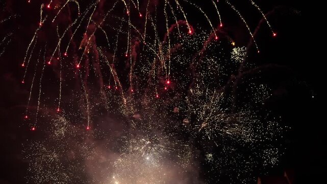 Spectacular 4K fireworks display exploding in the night sky during celebration.