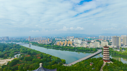 China Linqu ancient tower and urban garden architecture river landscape
