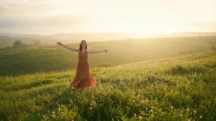Young Woman Celebrating Summer Solstice at Sunrise in Green Meadow