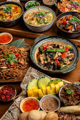 many different thai food dishes on table in modern restaurant in bangkok thailand