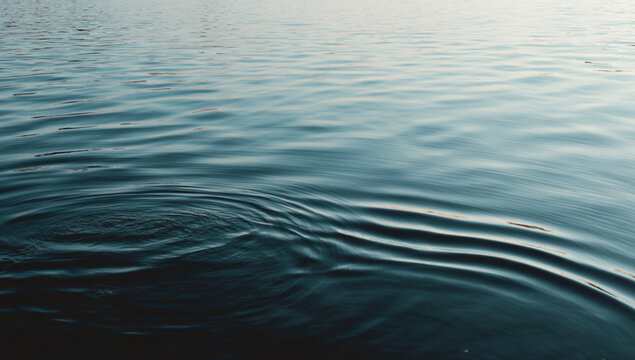 A bright water surface moments after all ripples have fully disappeared, absolute stillness, smooth and calm, high-key lighting, minimal realism