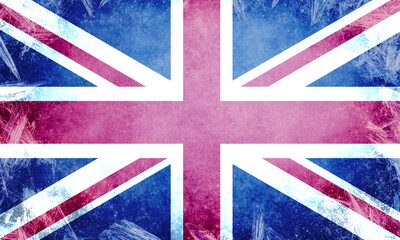 UK winter season - Union Jack flag framed by heavy ice and frost. Symbolic of the British cold weather, seasonal energy demands, and national preparedness during a winter freeze