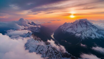 Timelapse, Aerial view of jagged mountain peaks at sunset with glowing orange lenticular clouds, scenic alpine landscape and nature timelapse for travel adventure and outdoor background - Powered by Adobe